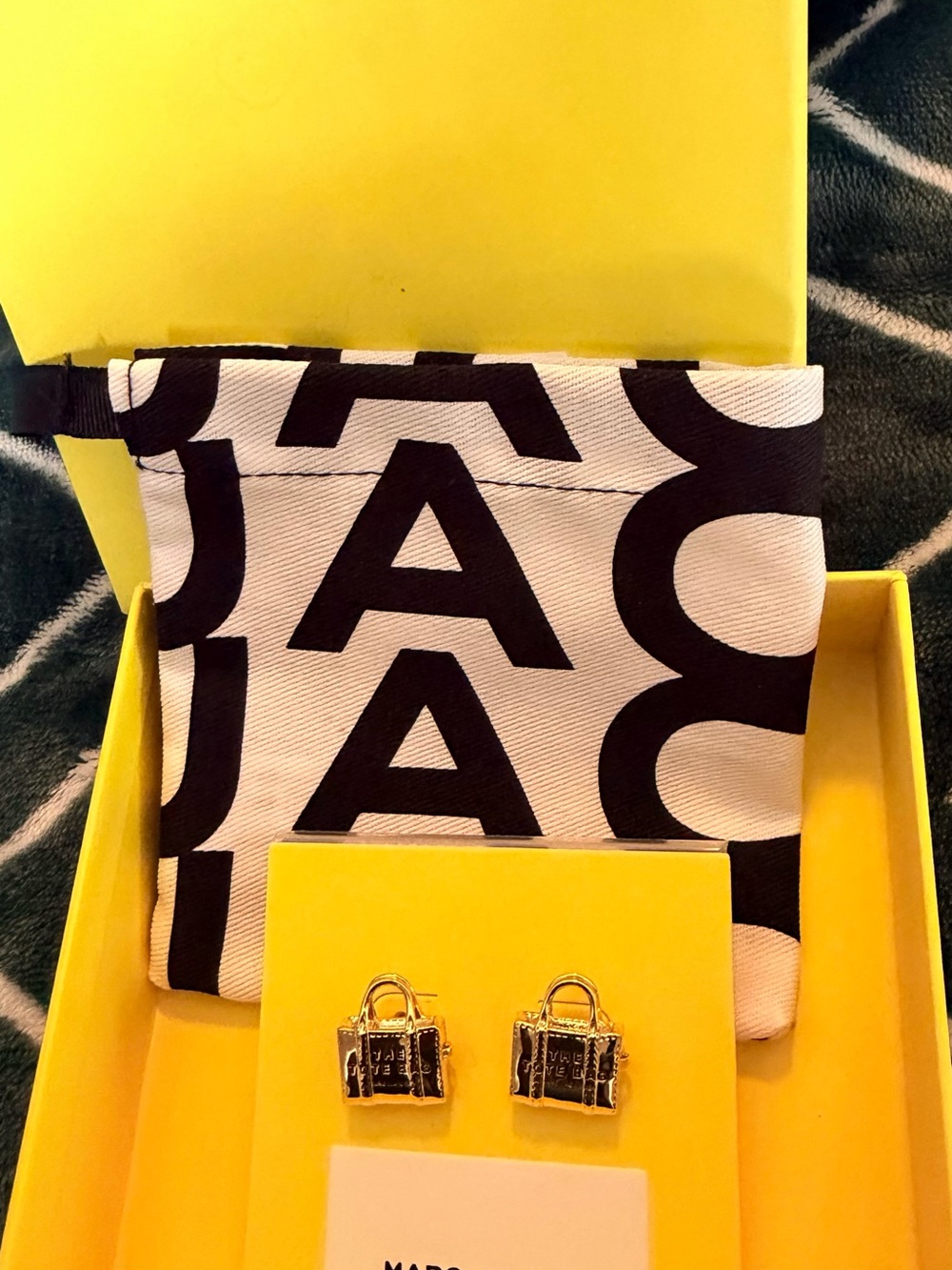 Marc Jacobs Gold Logo Earrings with black & white logo dust bag
